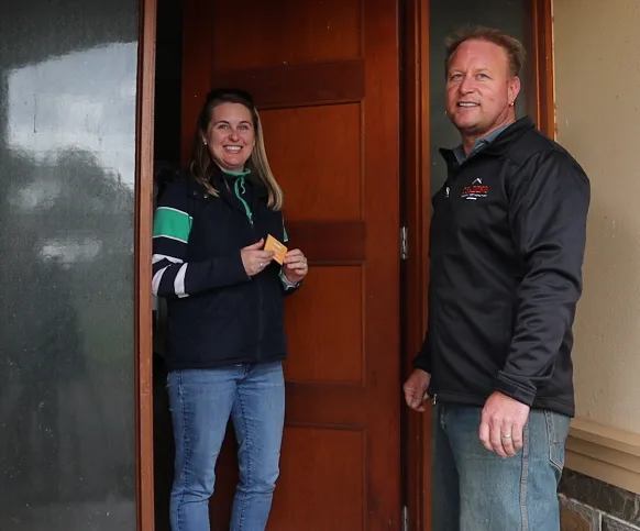Professional licensed building inspector performing a detailed pre-purchase property inspection